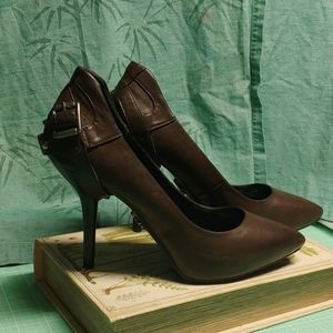 Brown leather pumps